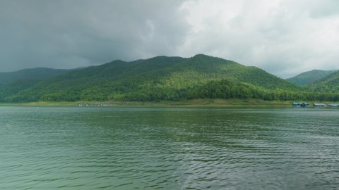 4K Cinematic landscape nature panoramic footage of the Mae Kuang Dam Lake at Doi Saket, Northern Thailand on a sunny day.