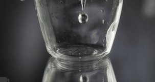Water is poured into a glass
