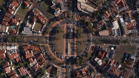 Drone footage of the Roundabout or meeting of Avenida Professor João Fiúsa and Avenida Independência in Ribeirão Preto SP Brazil. Traffic and vehicle traffic. A beautiful and well-kept city and metrop