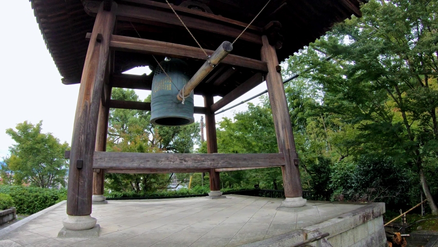Slow motion video of Big Bell in Kodaiji Buddhist temple in Higashiyama area of Kyoto, Japan, Camera moves around.
