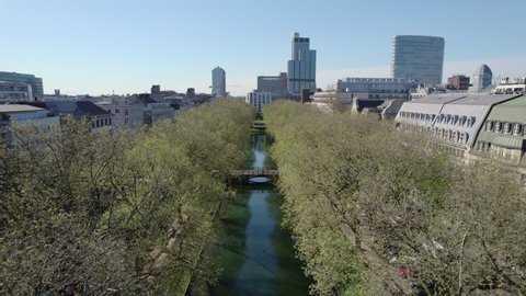Aerial view above famous shopping street, Köningsallee with Dusseldorf Skyline