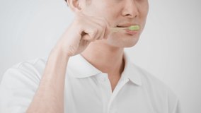 Young men taking care of their oral health Beauty Image - Powered by Shutterstock - Get 15% off with code: PIKWIZARD15