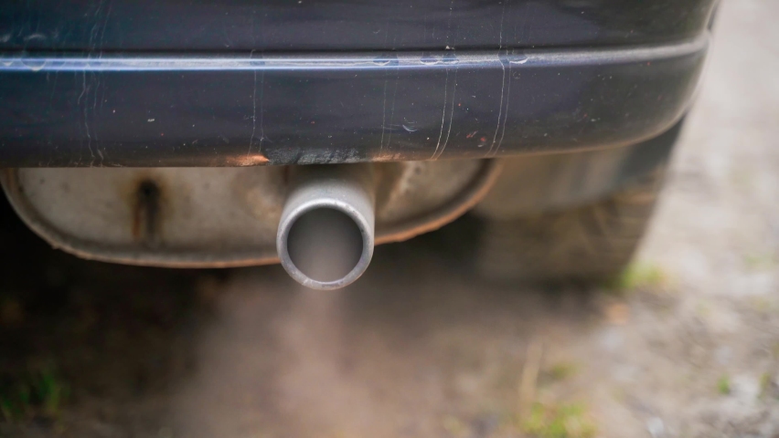 Close-up of gases coming out of a car exhaust pipe. High quality 4k footage Royalty-Free Stock Footage #1091525369