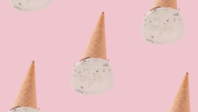 
Creative pattern made of vanilla ice cream on a pink background. 4K video.