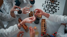 Science students with teacher doing chemical experiment in the laboratory at university. - Powered by Shutterstock - Get 15% off with code: PIKWIZARD15