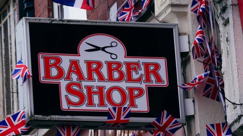 Barber shop with Union Jack bunting in England medium shot background selective focus Brighouse West Yorkshire UK 5th June 2022