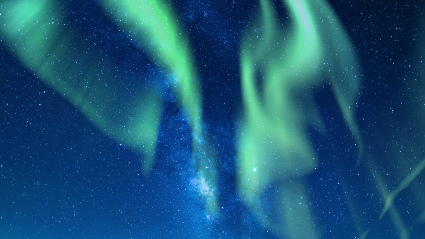 Aurora Green and Milky Way Galaxy Over Horizon 20mm South Tilt Down | Shutterstock HD Video #1091536385