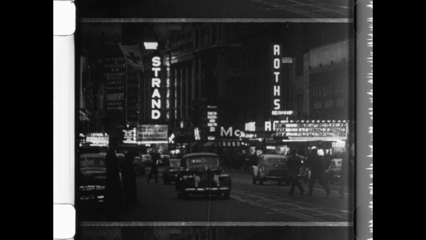 1944 NYC, Broadway Lights and Movie Marquees in New York City at night. Ziegfeld Follies and Milton Berle at The Strand Theater. WWII Service Men entering Movie Theater. 4K Overscan of Archival Film
