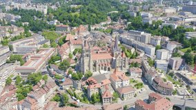 Inscription on video. Lausanne, Switzerland. Cathedral of Lausanne. La Cite is a district historical centre. Text furry, Aerial View, Point of interest