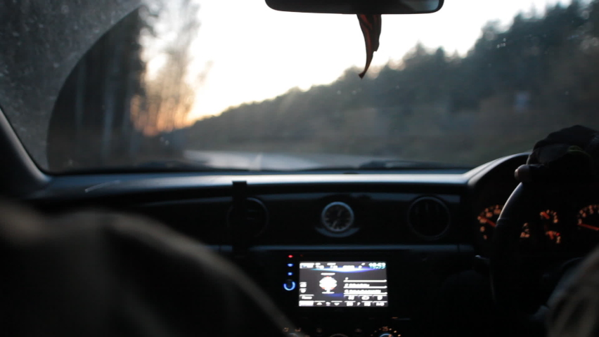 View from the back seat of a car driving on the highway. DOF | Shutterstock HD Video #1091541297