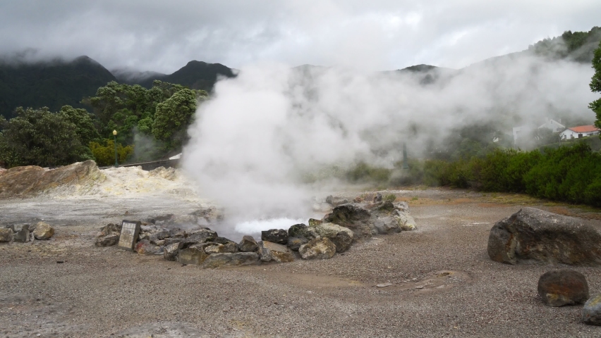 Steam rising from geothermal hot springs in town of Furnas, Sao Miguel ...