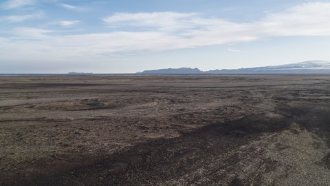 Establishing Aerial View Shot of Icelandic desert, rock formations and mountains, Iceland