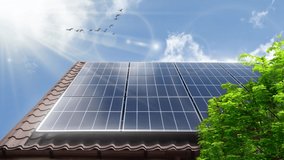 Concept clean power energy - solar panel close-up on roof. Green tree. Conceptual video