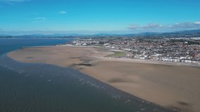 4K: Aerial Drone Video of Morecambe Bay in Lancashire, UK. Approach shot with Beach. Stock Video Clip Footage. Wide 