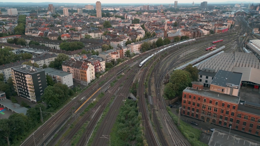 High-Speed ICE train departing the Cologne train station to Düsseldorf in a descend camera Drone flight in June 2022 Royalty-Free Stock Footage #1091585319