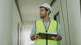 engineer inspector check  and inspect on clipboard in building in sitework, checking worker work and inspection concept - Powered by Shutterstock - Get 15% off with code: PIKWIZARD15
