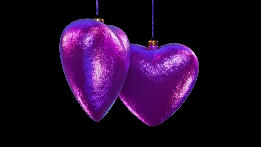 Realistic seamless looping 3D animation of two hanging orbital spinning shining fancy textured violet purple iridescent Christmas hearts rendered in UHD with alpha matte | Shutterstock HD Video #1091595503