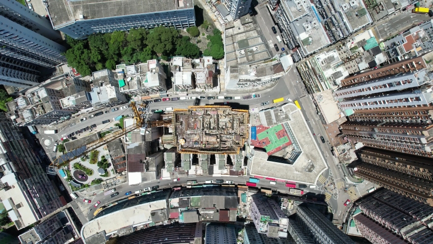 Commercial and residential construction development project in Kwun Tong of Hong Kong city, becoming the newest business district near Kowloon Bay and Victoria harbor, Aerial drone skyview | Shutterstock HD Video #1091601819