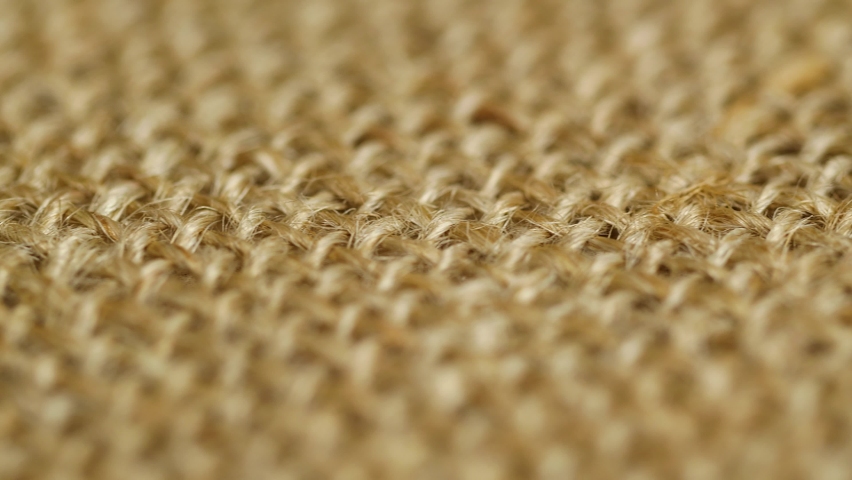 Macro brown vintage jute sack texture, closeup burlap fabric textile background | Shutterstock HD Video #1091608927