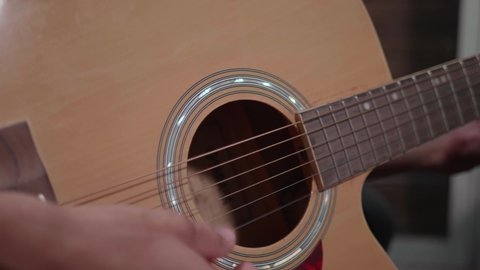 hand playing guitar Close up