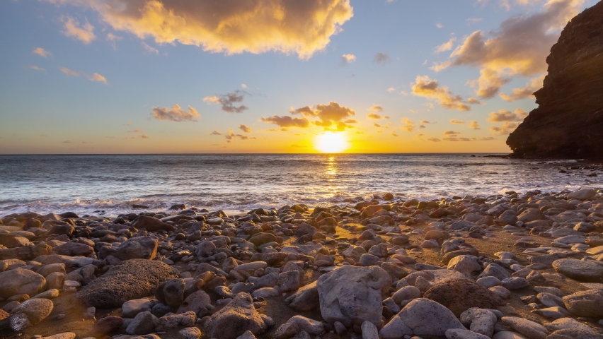 A timelapse of a sunset at sea over the horizon on a beach in gran canaria | Shutterstock HD Video #1091612751