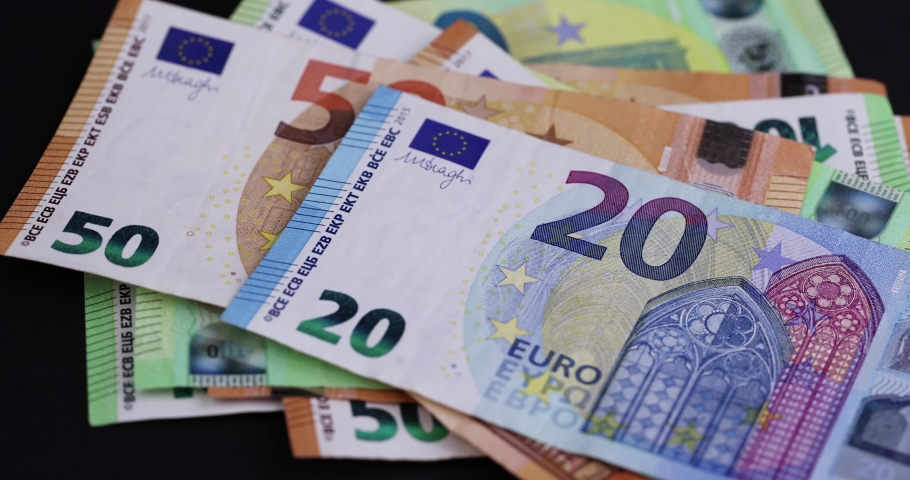 Put one hundred , twenty, fifty euro of the European Union , 100, 50, 20, 10 euro bills to add up during the bill | Shutterstock HD Video #1091614037