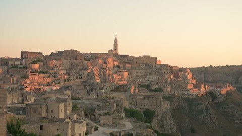 Stunning view of the Matera’s skyline during a beautiful sunrise. Matera is a city on a rocky outcrop in the region of Basilicata, in southern Italy.