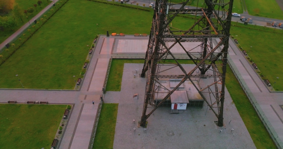 Aerial view of the wooden broadcasting tower in Gliwice with the city of Gliwice in the background. The concept of the largest wooden tower in the world.