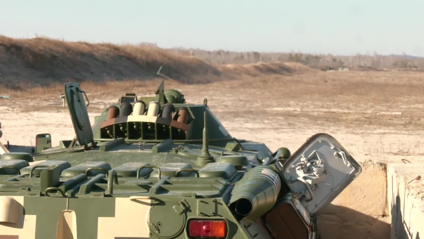 Ukrainian infantry fighting vehicle shoots at a target