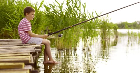 Little Boy Sitting On Edge Wooden Stock Footage Video (100% Royalty 