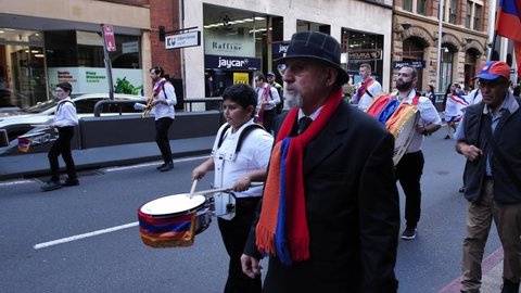 SYDNEY, NSW, AUSTRALIA. APRIL 24 2022. Religious leaders follow Armenian genocide march through Sydney, slow motion. Australian-Armenian community hold marches for justice on Genocide Remembrance Day.