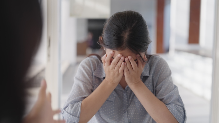Great resignation fatigue workforce crisis toxic workplace issue. Bored sad annoy team asia two people bad anger yell tired sit at office table talk rude to staff worker in wrong project refuse reject | Shutterstock HD Video #1091635969
