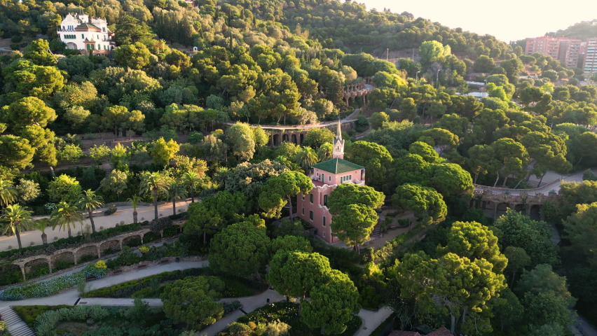 Aerial view of Park Guell by Antonio Gaudi at sunrise in Barcelona, Catalonia, Spain. Famous and extremely popular travel destination in Europe