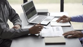 Business team meeting present, investor colleagues discussing new plan financial graph data on office table with laptop, teamwork company meeting concept. - Powered by Shutterstock - Get 15% off with code: PIKWIZARD15