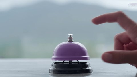 Hand Ringing Metal Bell Outdoor Background Stock Footage Video (100%