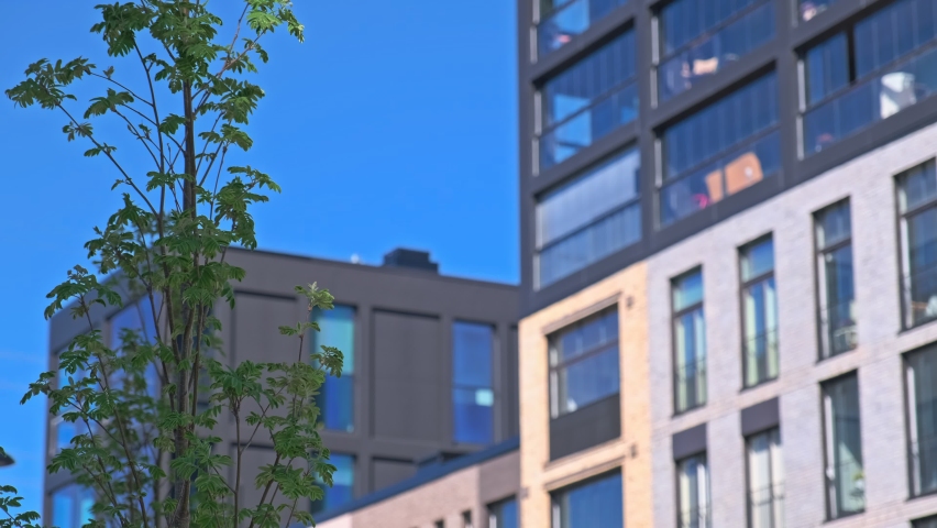 Modern Nordic Architecture. The brick facade of modern residential buildings on the blurred background. Sompasaari neighborhood of Helsinki, Finland.
