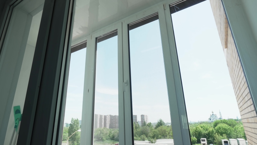 roller shutters for windows in the apartment on the sunny side. a complete blackout from the sun and for the night. Royalty-Free Stock Footage #1091653867