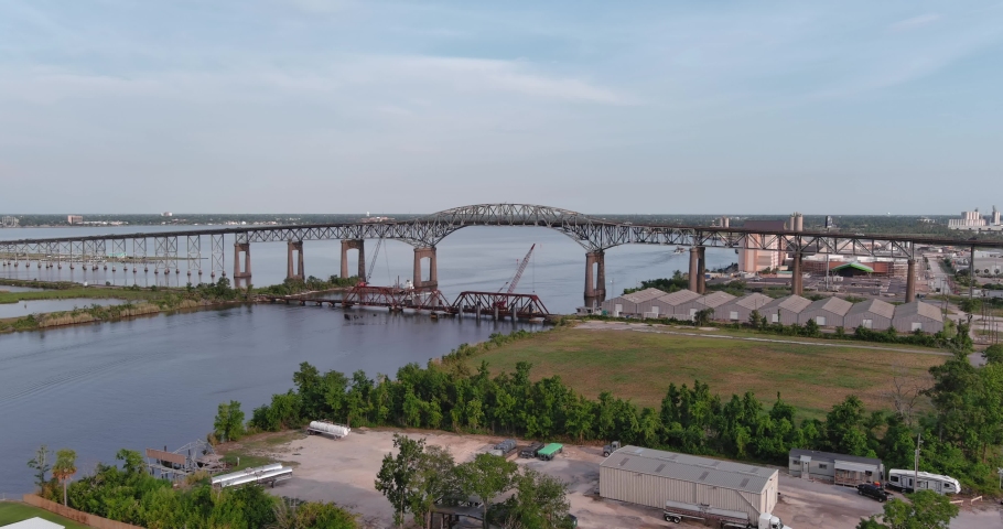 Aerial of cars traveling over the Calcasieu River Bridge in Lake Charles, Louisiana Royalty-Free Stock Footage #1091657607