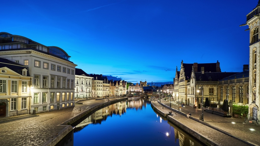 Ghent night timelapse showing the Leie (Lys) river and historic waterfront buildings. Belgium