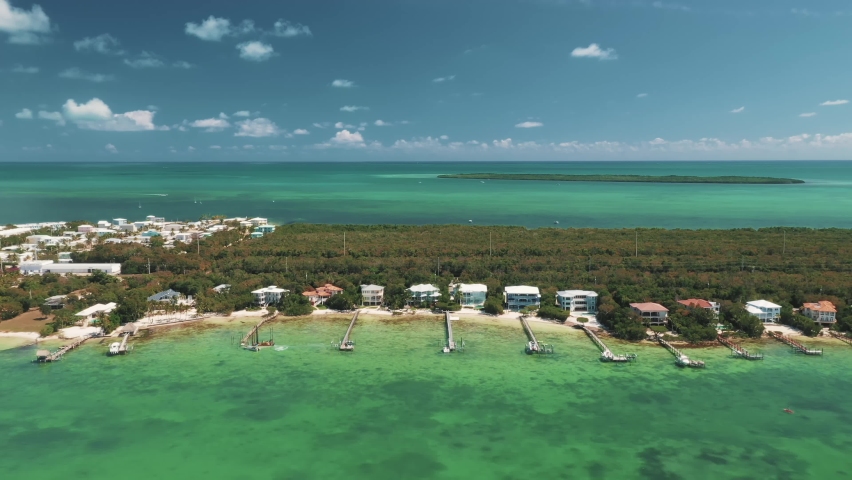 Aerial View Of Coastal Accommodation Buildings In Florida Keys, Florida, USA. drone shot