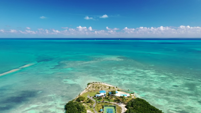 Private Beach Resort With Recreation Area In Tea Table Key Island, Islamorada, Florida. aerial pullback Royalty-Free Stock Footage #1091674911