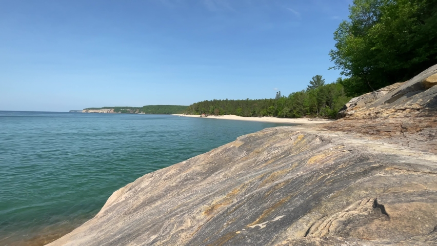 Pictured Rocks National Lakeshore Large Rock Formations Blue Sky Sunny Day On Lake Superior