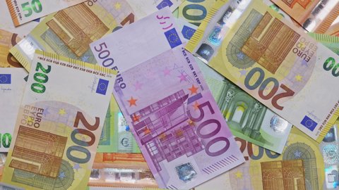 Rich euro bills, money background. Euro money in different denominations, money close-up. Five hundred euro banknotes above. Euro zone