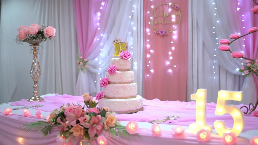 elegant 15 years birthday cake in pink tones Royalty-Free Stock Footage #1091689173