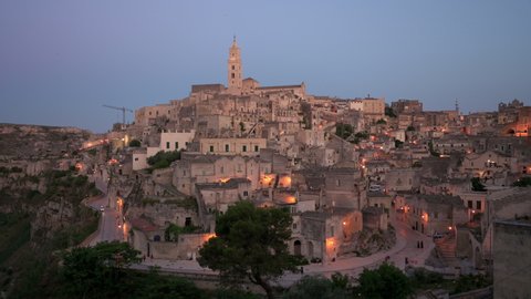 Stunning view of the Matera’s skyline during a beautiful sunset. Matera is a city on a rocky outcrop in the region of Basilicata, in southern Italy.