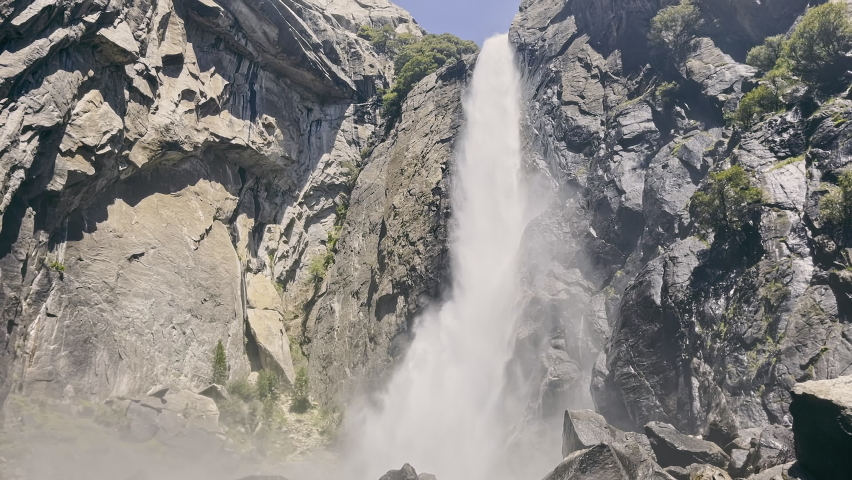Yosemite Big waterfall close up. Yosemite national Park, California, USA. Waterfall on the rocks of stone.