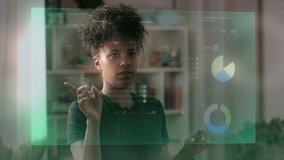 
Young African American Woman Using Futuristic Augmented Reality Software Interface for Managing Business and Marketing Projects. Virtual Reality VFX Animation with Financial Data and Charts.  - Powered by Shutterstock - Get 15% off with code: PIKWIZARD15