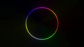An animated 4k video of a rotating ring consisting of different colours pulsating with vibrations while rotating on a colour-changing background.