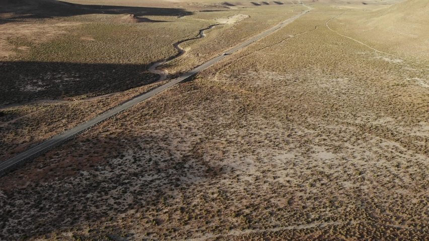 Truck Pulling RV Trailer through Nevada Desert - Aerial Drone | Shutterstock HD Video #1091759981
