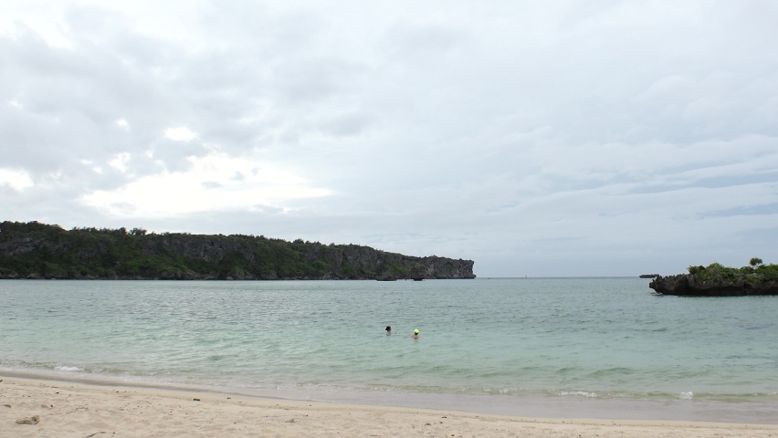 ONNA-SON, OKINAWA, JAPAN - AUGUST 2021 : View of Manza beach (Ocean or sea). Wide view, time lapse shot in sunny daytime. Summer holiday, vacation and resort concept video. | Shutterstock HD Video #1091760893